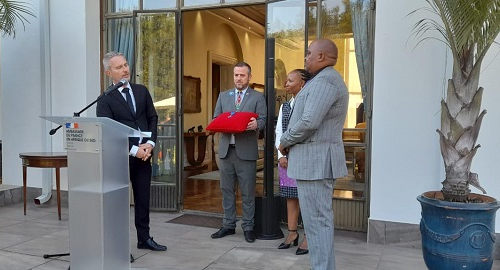 Prof Bismark Tyobeka receives the National Order of Merit from French Ambassador David Martinon. With Prof Tyobeka is his wife Ngeniswa. 