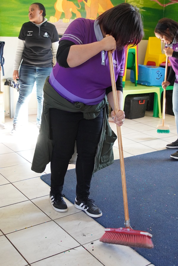 Cleaning the centre in an act of kindness. 