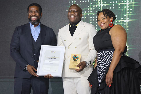  From left are Minister of Higher Education Buti Manamela, Martin Maupa, and Zimkhitha Peter, CEO of Allan and Gill Gray.