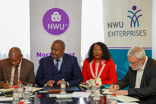 Signing the MoU are Mr Phenyo Mogamisi, CEO of CIH Venture Capital, Prof. Bismark Tyobeka, NWU principal and vice-chancellor, Prof. Anna Mokgokong, NWU chancellor and founder and group chairperson of Community Investment Holdings (CIH), and Mr Duncan Raftesath, CEO of NWU Enterprise
