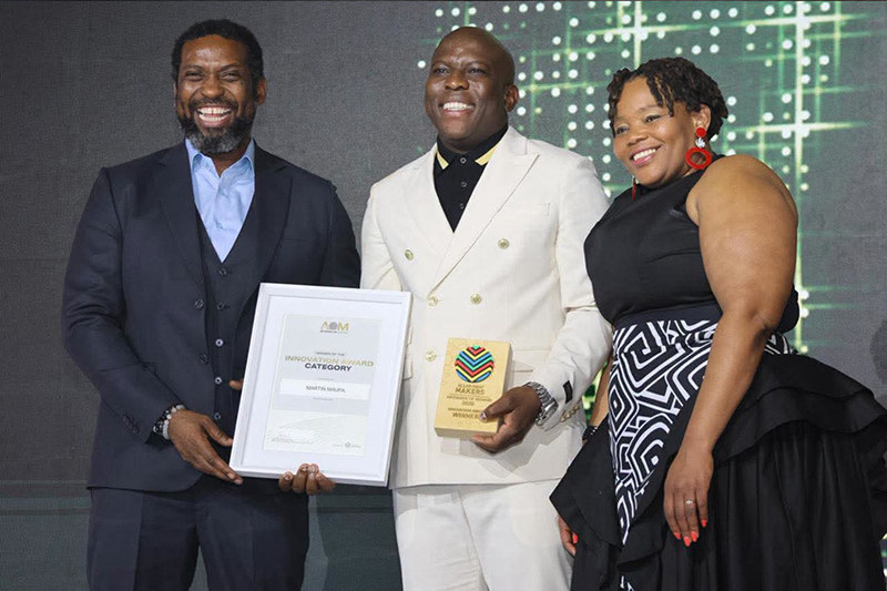 From left are Minister of Higher Education Buti Manamela, Martin Maupa, and Zimkhitha Peter, CEO of Allan and Gill Gray.