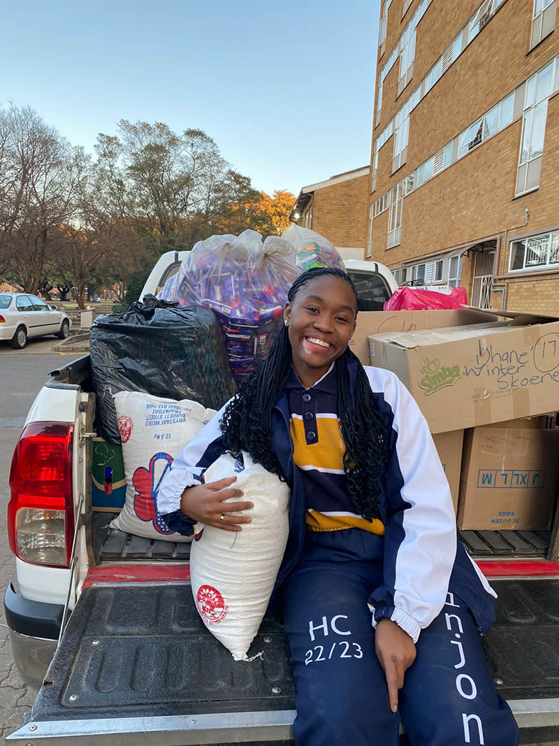 Mohau Phala is a recipient of the prestigious Abe Bailey Fellowship. Here she is collecting essential supplies to support individuals and families in need through a community donation drive.