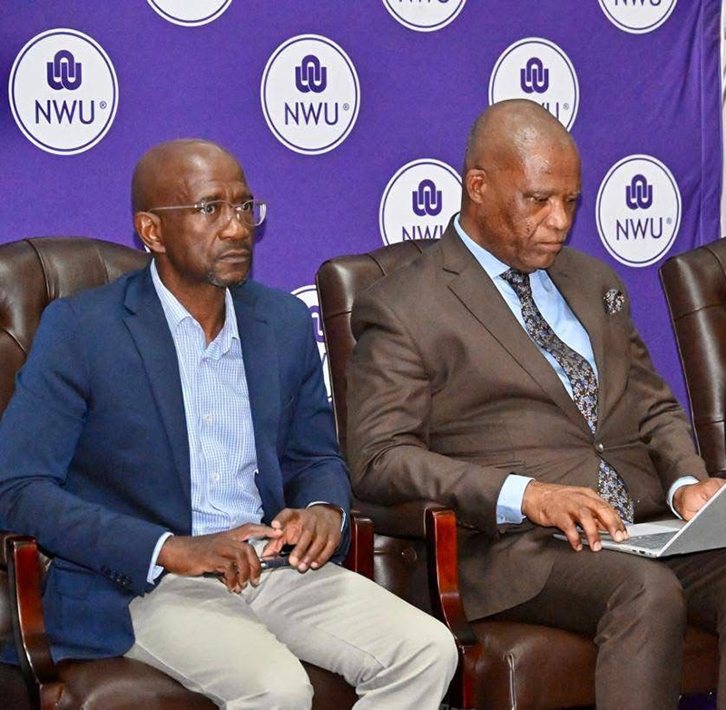 Dr Joe Molete, deputy vice-chancellor for student life, transformation, people and culture with the assigned function of the Mahikeng Campus, with the Deputy Minister of Cooperative Governance, Dr Namane Dickson Masemola.
