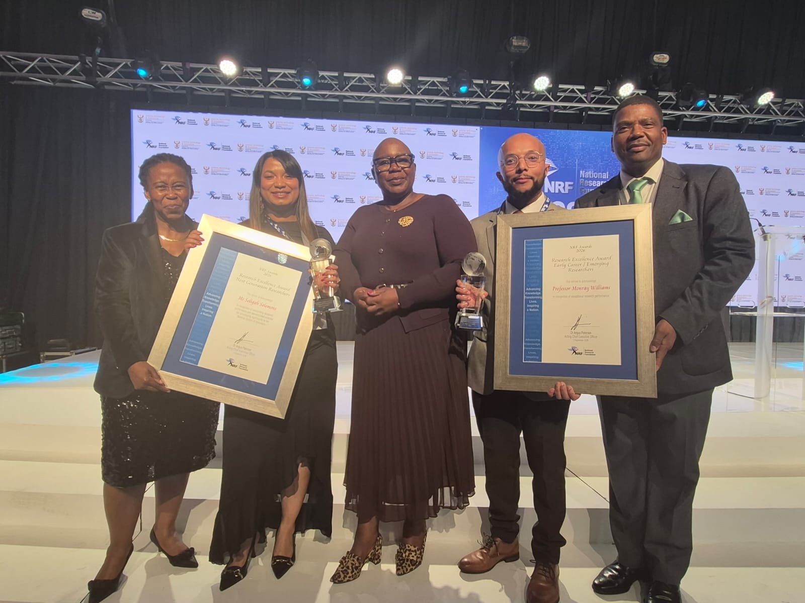 : A proud moment: Prof. Nnenesi Kgabi, chief director for Research and Postgraduate Support at the NWU, Soligah Solomons, Nomalungelo Gina, Deputy Minister of Science, Technology and Innovation, Prof. Monray Williams and Prof. Jeffrey Mphahlele.