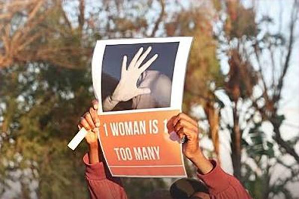 protest poster against gender based violence